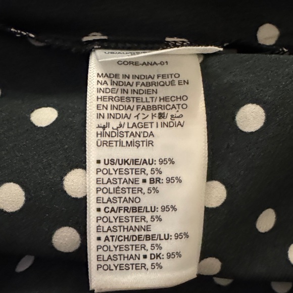 Elegant Black and White Polka Dot Midi Dress - Picture 9 of 9